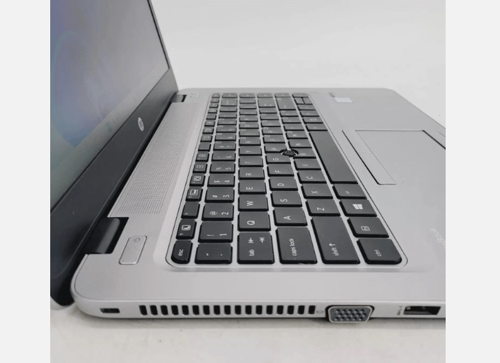 Side profile of HP EliteBook 840 G3 showing USB, VGA, DisplayPort and Ethernet ports